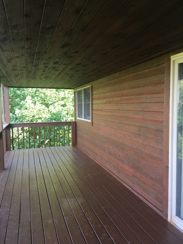 Log cabin finished in Men-Wood Coatings