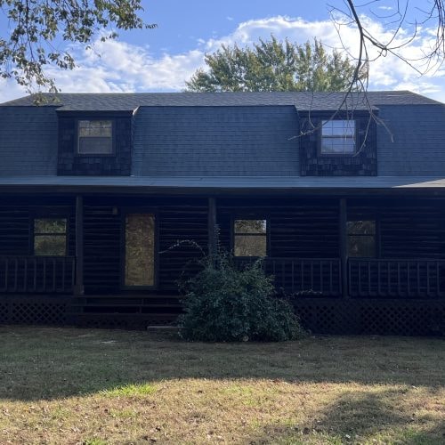 Dark wooden house finished in Tobacco