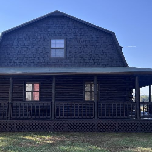 Rustic barn house finished in Tobacco