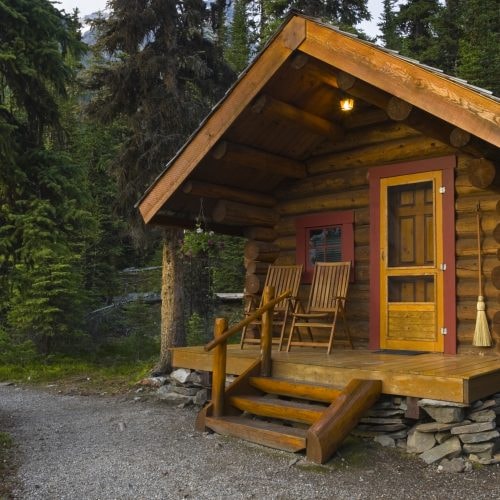 Log cabin porch finished in Harvest Gold