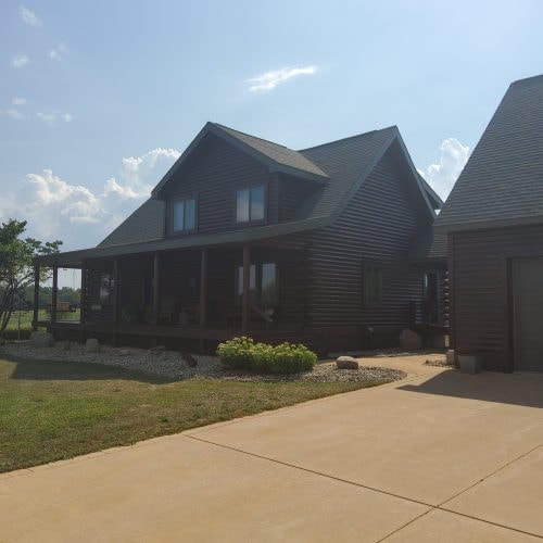 Modern dark farmhouse finished in Men-Wood Coatings