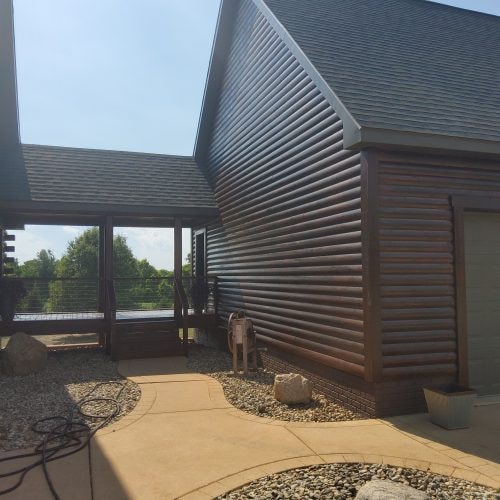 Modern home exterior finished in Men-Wood Coatings